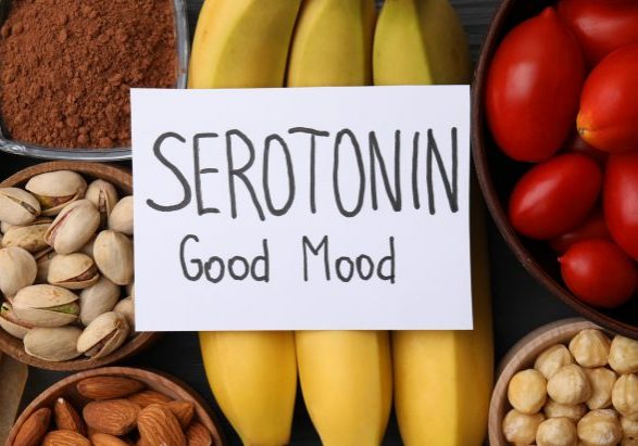 Many different products and card with phrase Serotonin Good Mood on table, flat lay. Natural antidepressants